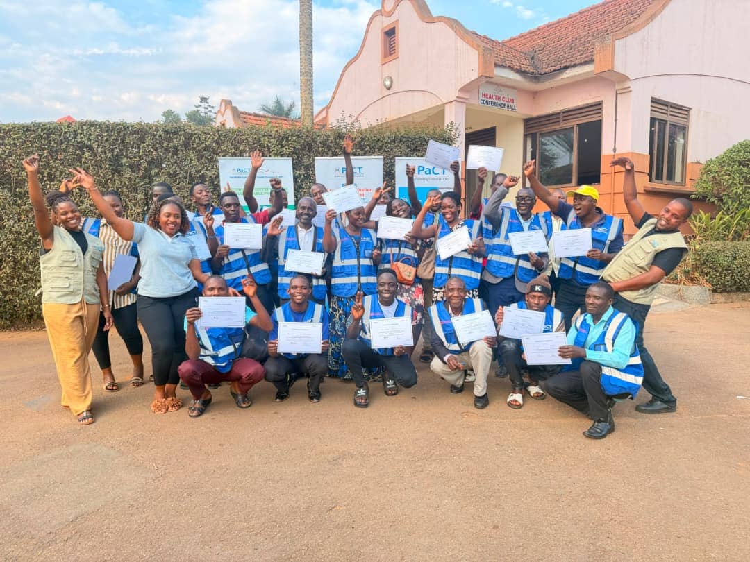 Members smiling after receiving their certificates